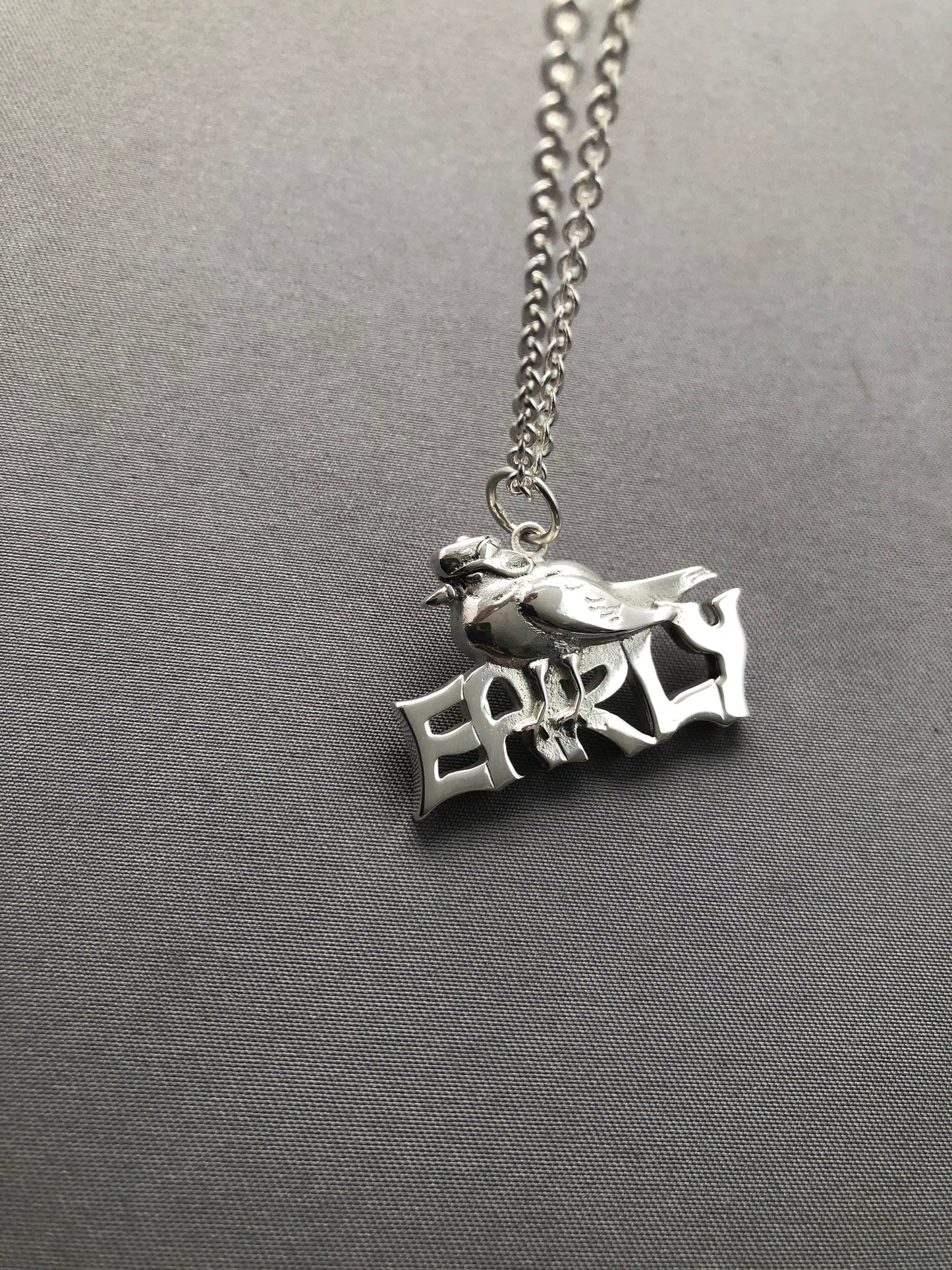 Ladies solid silver early bird pendant & chain