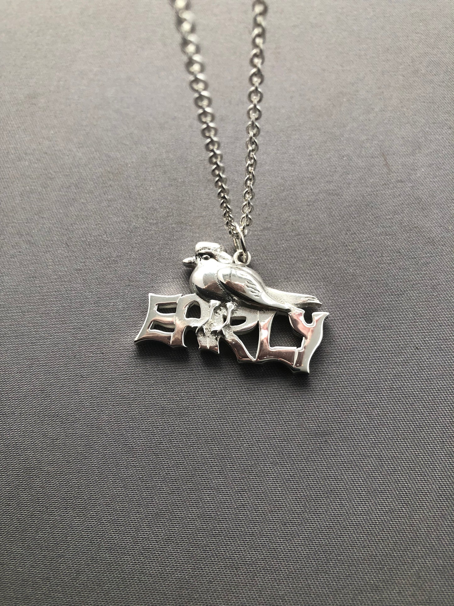 Ladies solid silver early bird pendant & chain