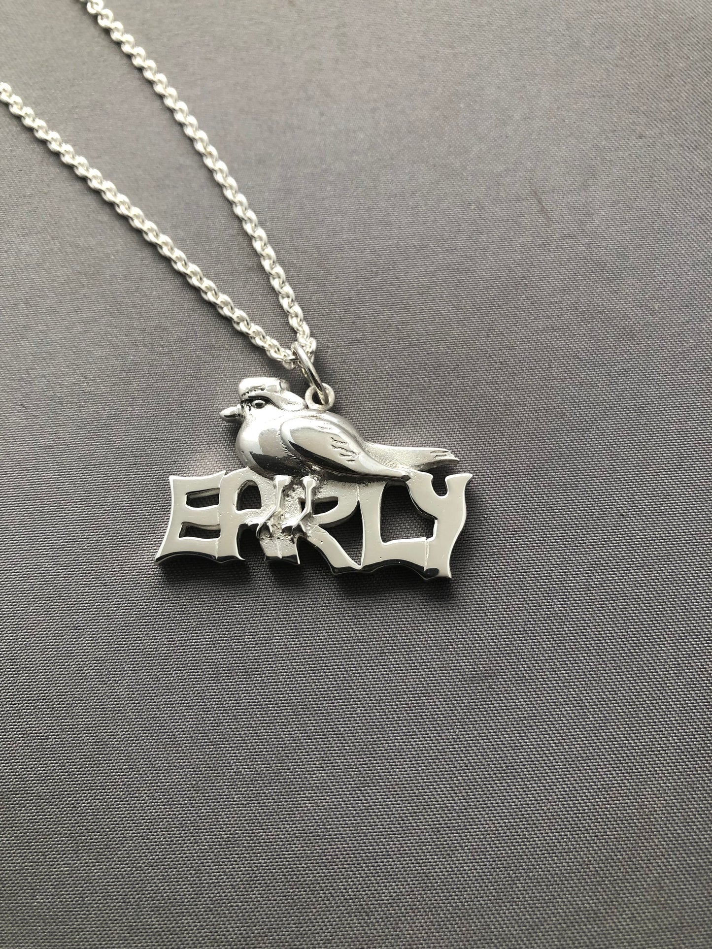 Ladies solid silver early bird pendant & chain