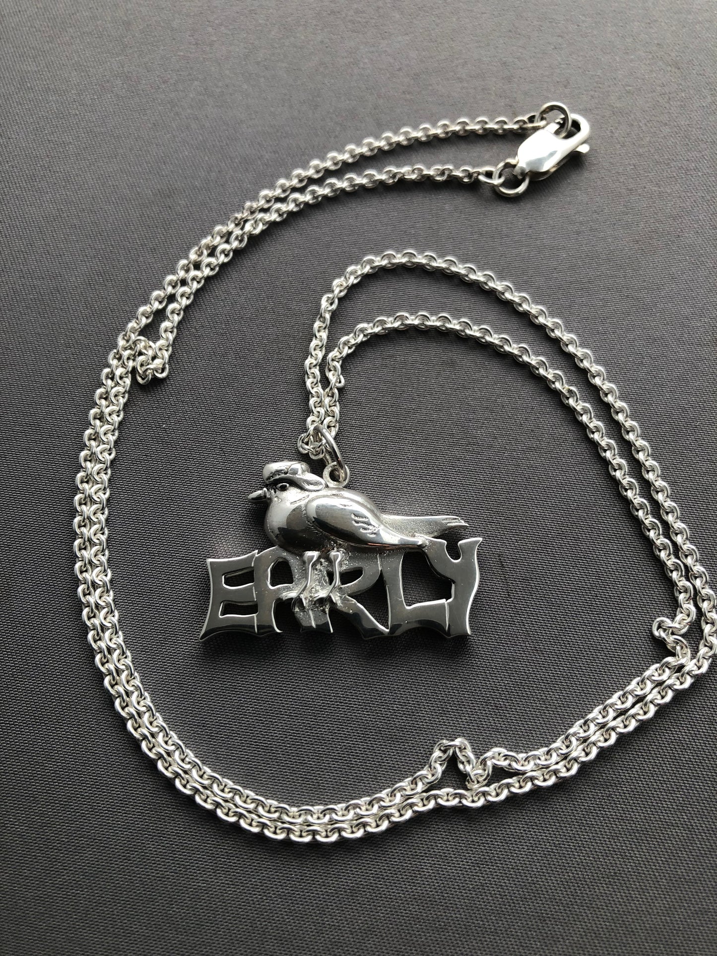 Ladies solid silver early bird pendant & chain