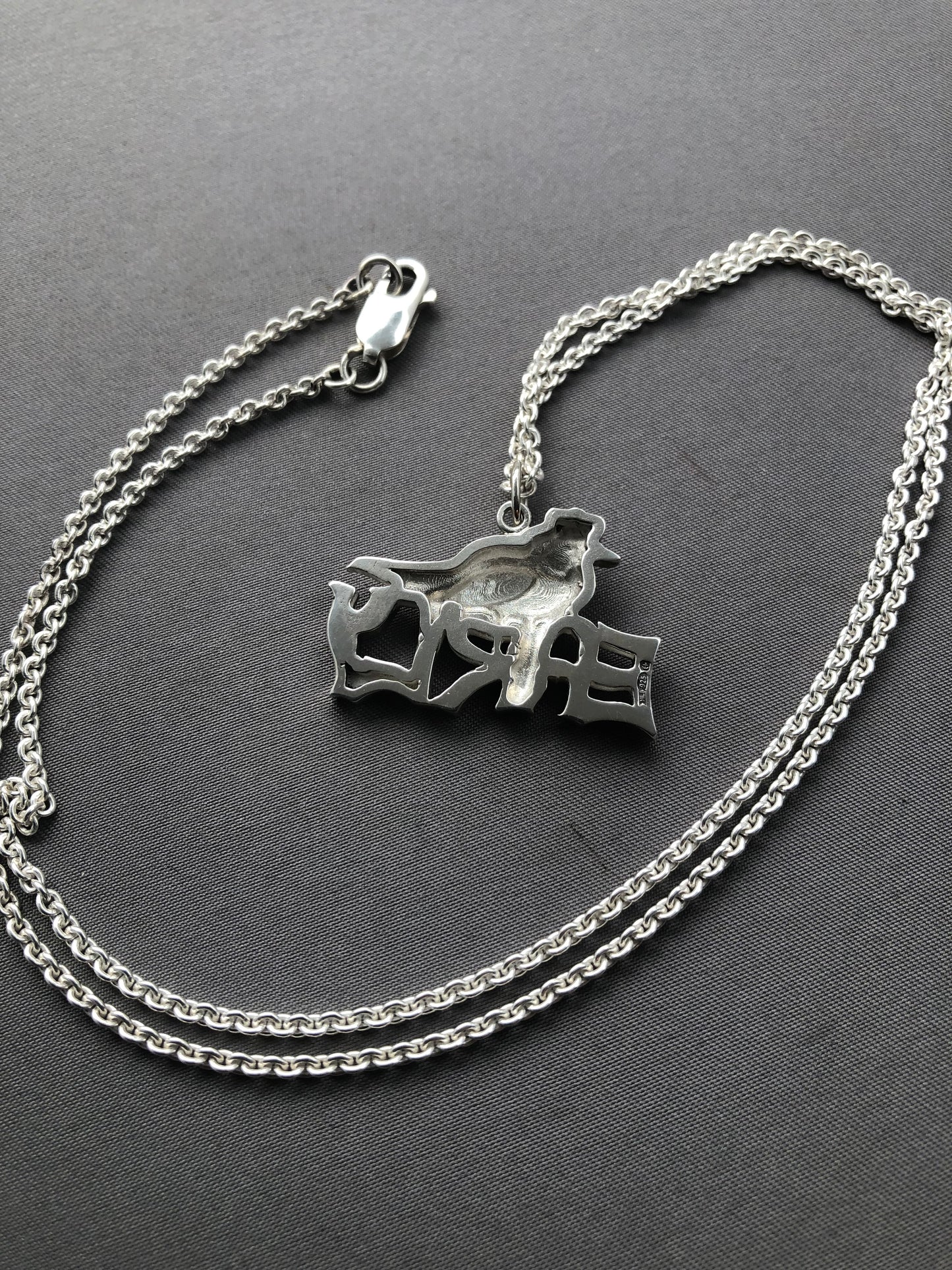 Ladies solid silver early bird pendant & chain