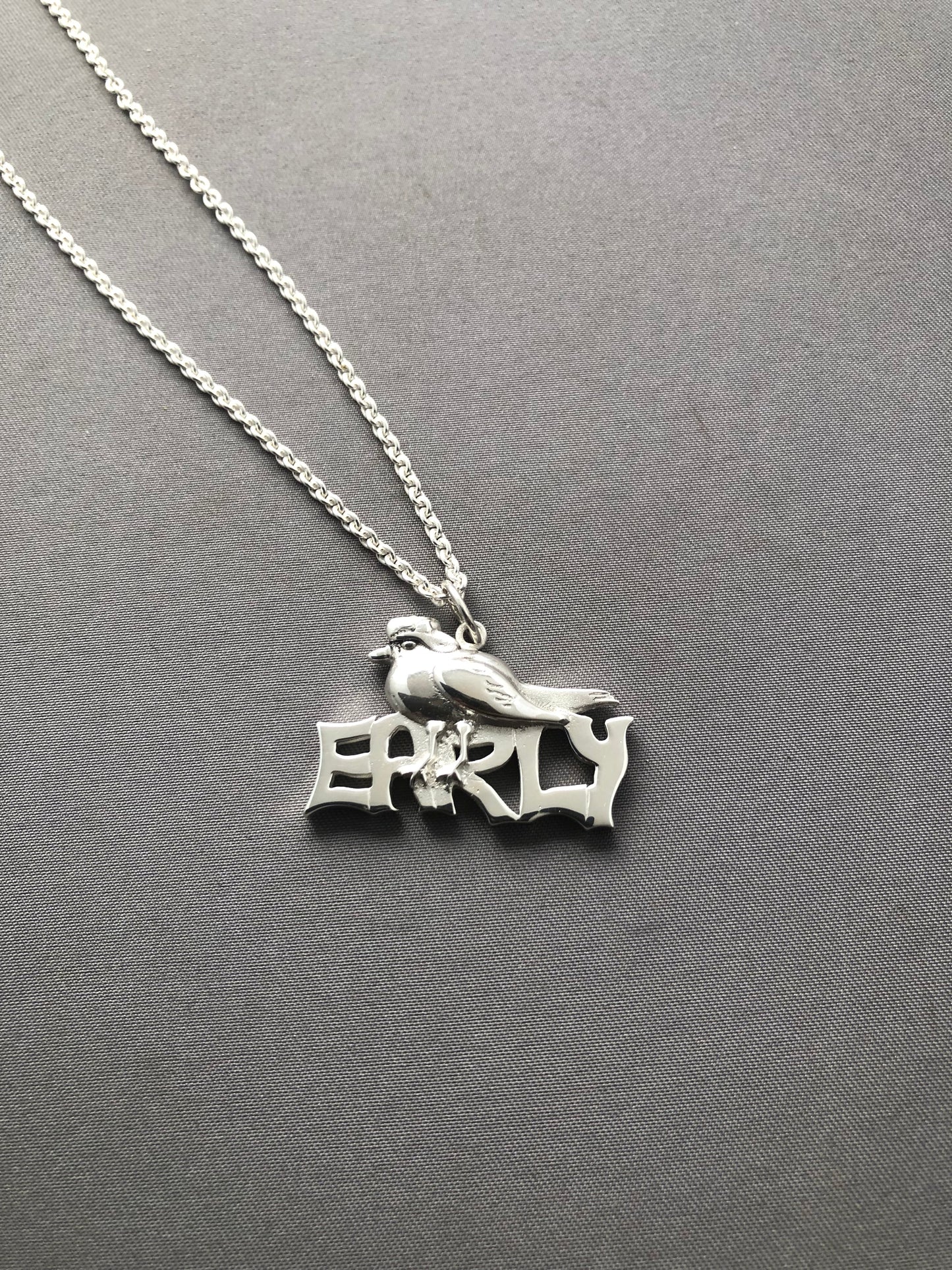 Ladies solid silver early bird pendant & chain