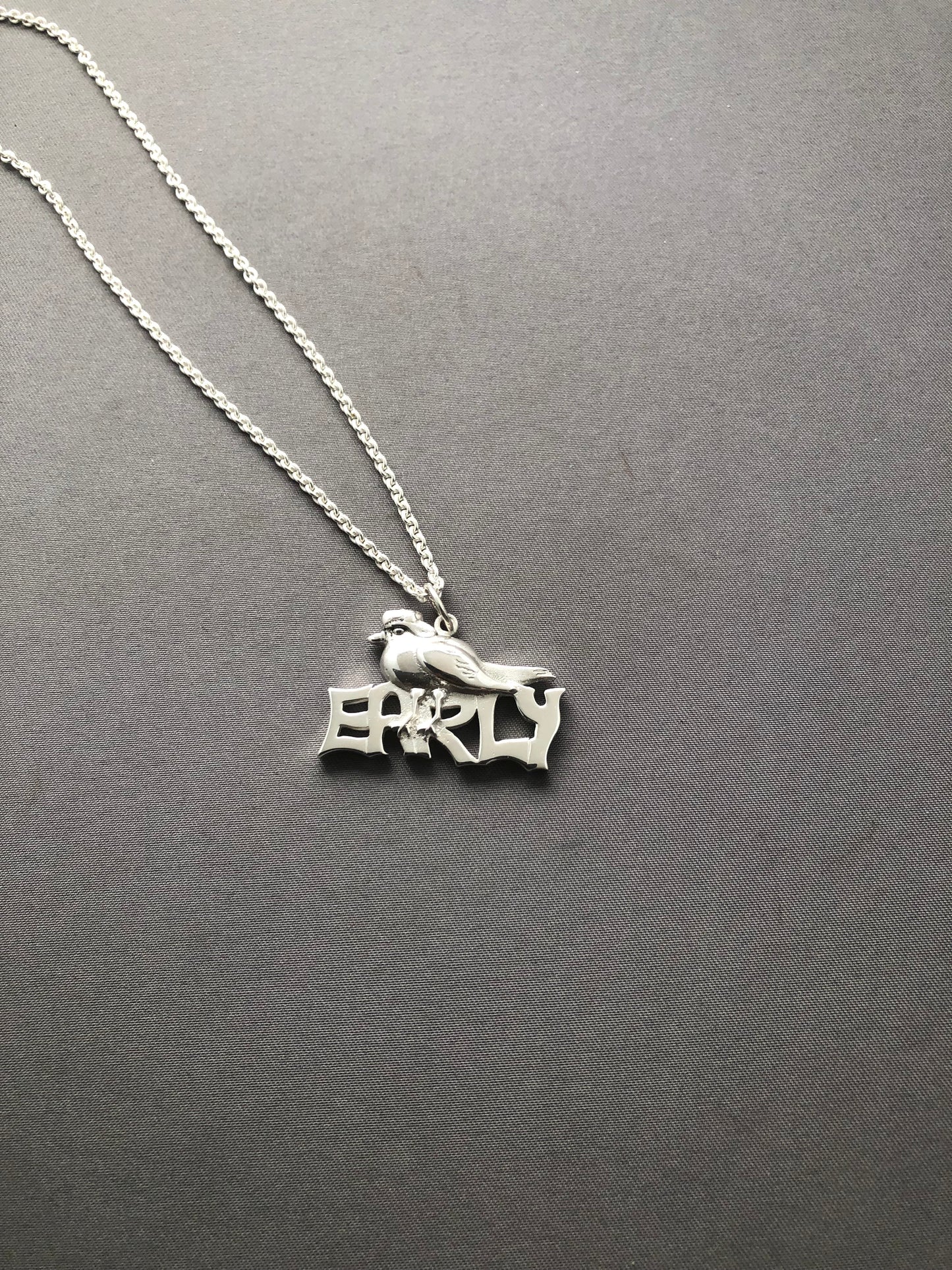 Ladies solid silver early bird pendant & chain