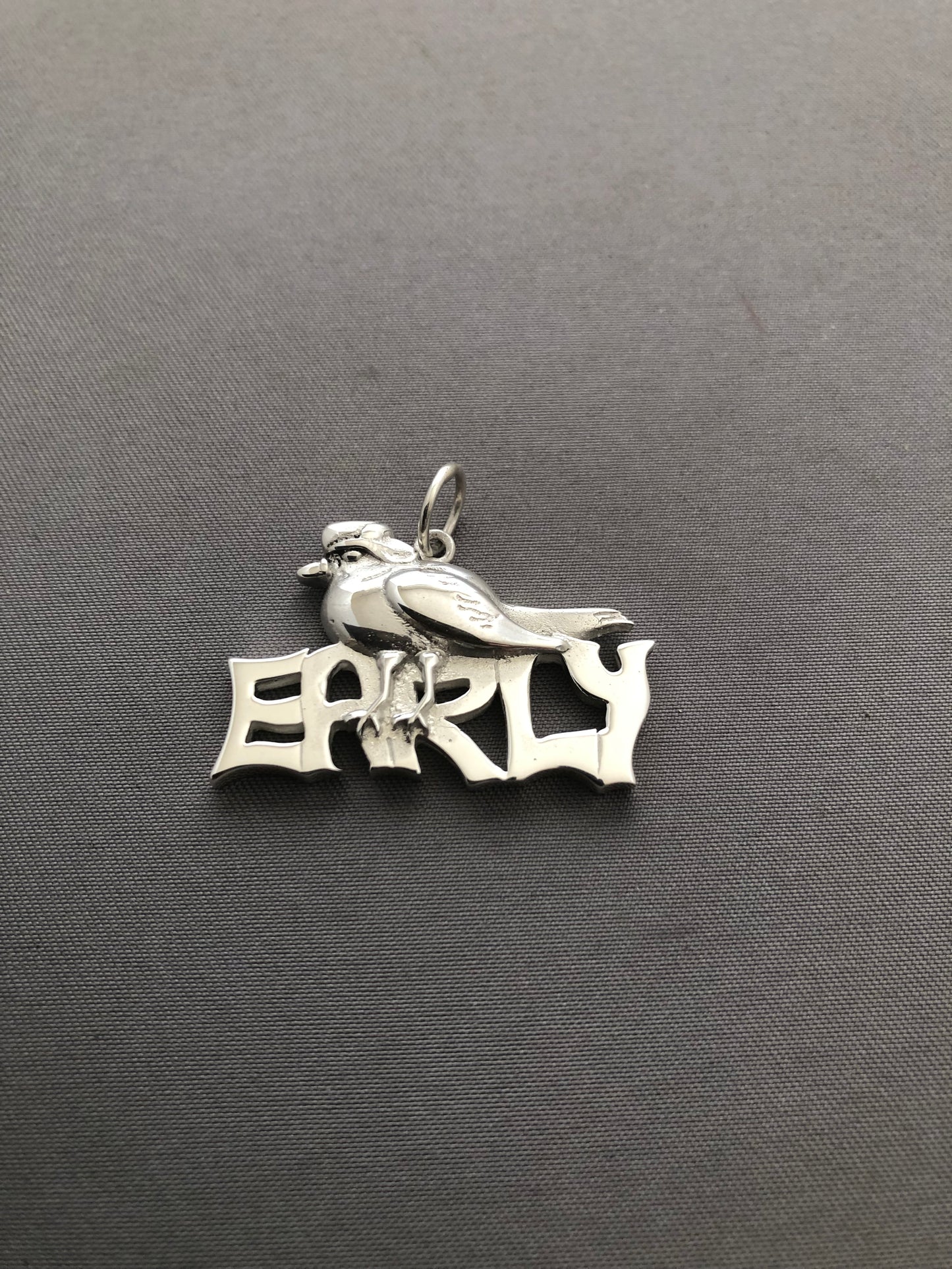 Ladies solid silver early bird pendant & chain