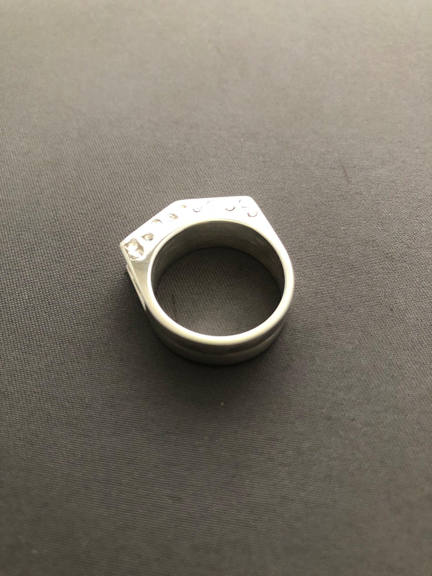 Silver structured ring
